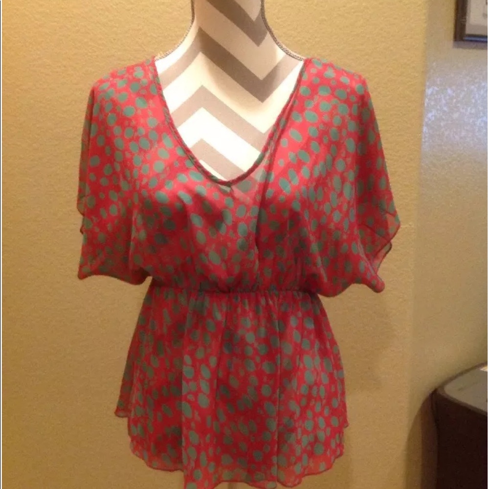 Coral and green blouse